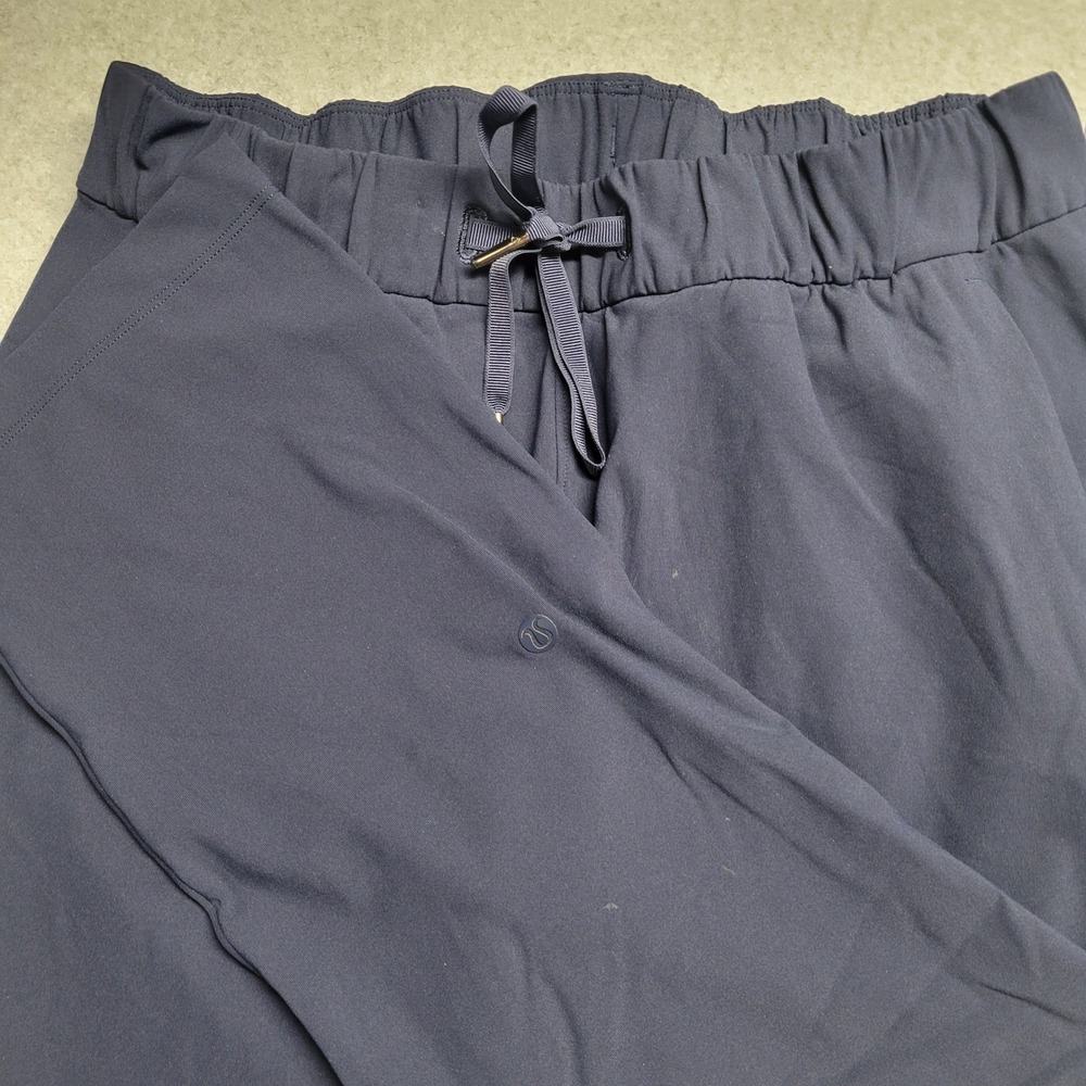 Lululemon On the Fly 7/8 Pant Navy Blue Luxtreme Drawstring Trousers Size 6